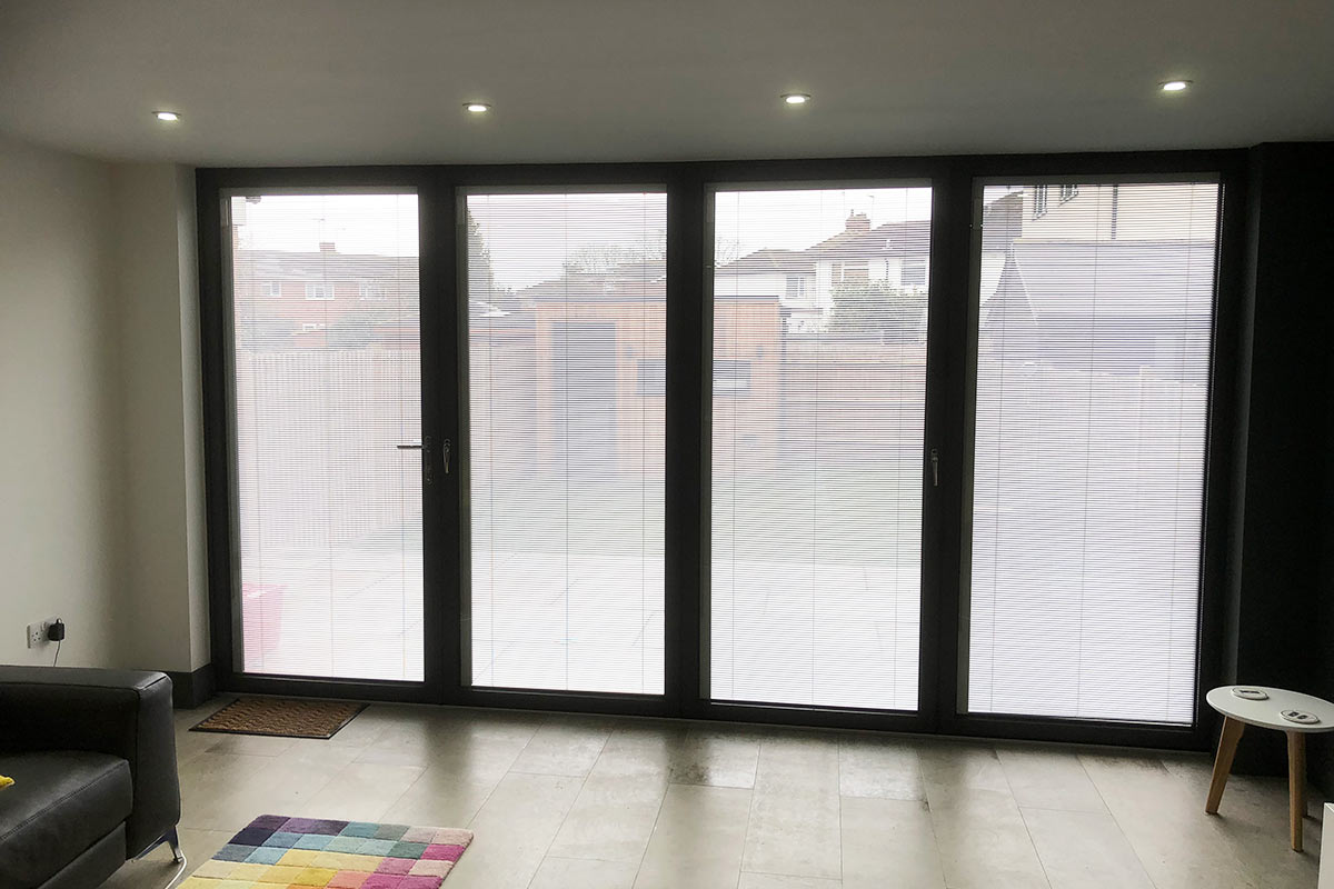 inside view Visofold 1000 bifold doors with integrated blinds